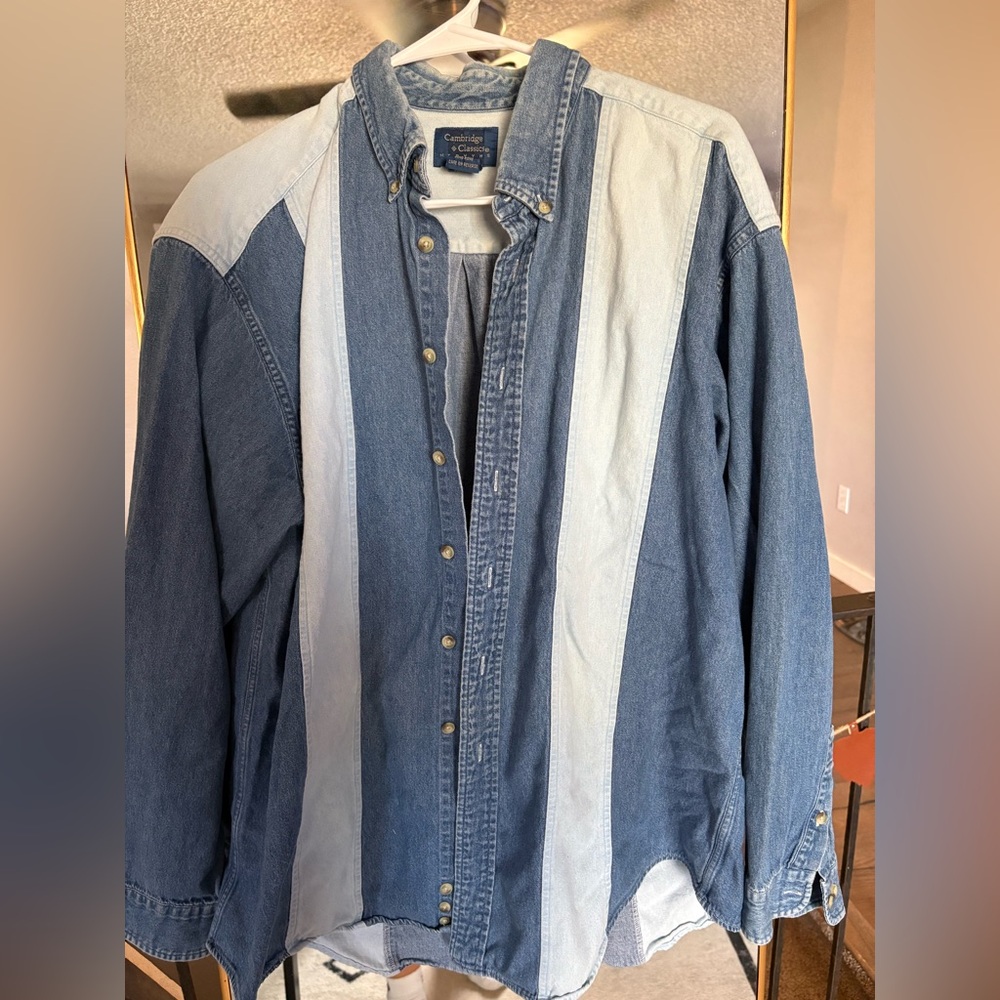 Size XL two tone denim button up. Vintage and worn. Very cute and on trend.